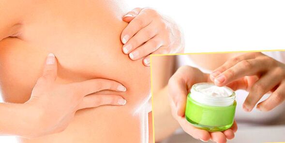 Massaggio correttivo al seno con crema grassa